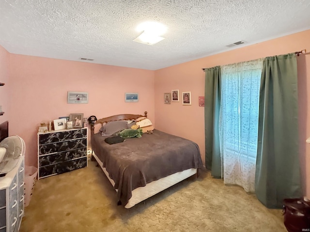 4329 Rutgers Dr Unit 40B, Anderson, IN 46013 - bedroom with carpet flooring and a textured ceiling