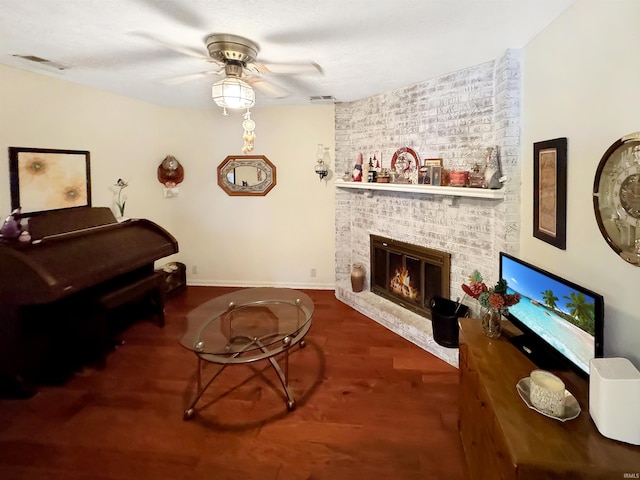 4329 Rutgers Dr Unit 40B, Anderson, IN 46013 - living room with ceiling fan, wood finished floors, and a brick fireplace