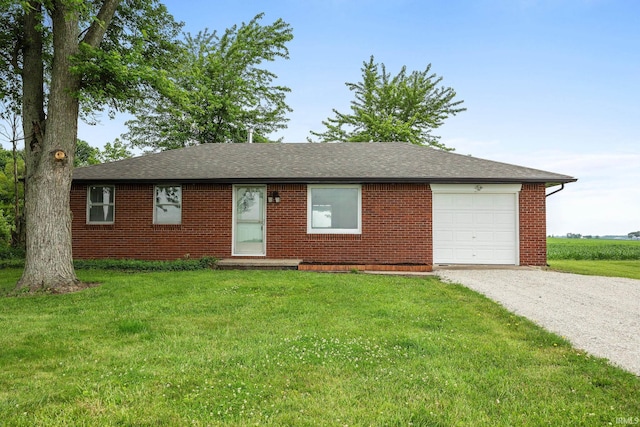 8416 S 400 W, Lafayette, IN 47909 - ranch-style home featuring gravel driveway, an attached garage, brick siding, and a front yard