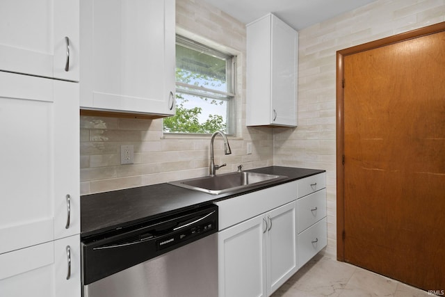 8416 S 400 W, Lafayette, IN 47909 - kitchen featuring stainless steel dishwasher, dark countertops, white cabinets, and light marble finish flooring