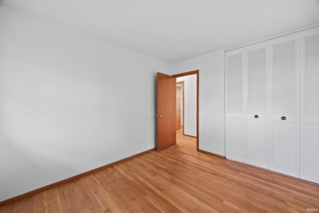 8416 S 400 W, Lafayette, IN 47909 - unfurnished bedroom featuring light wood-style flooring and a closet
