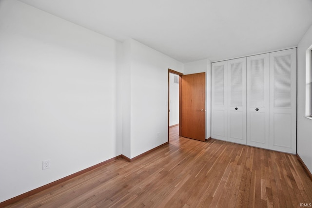 8416 S 400 W, Lafayette, IN 47909 - unfurnished bedroom with wood finished floors and a closet
