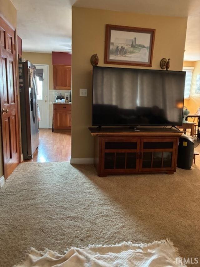 1814 W Kem Rd, Marion, IN 46952 - living room with light carpet and baseboards