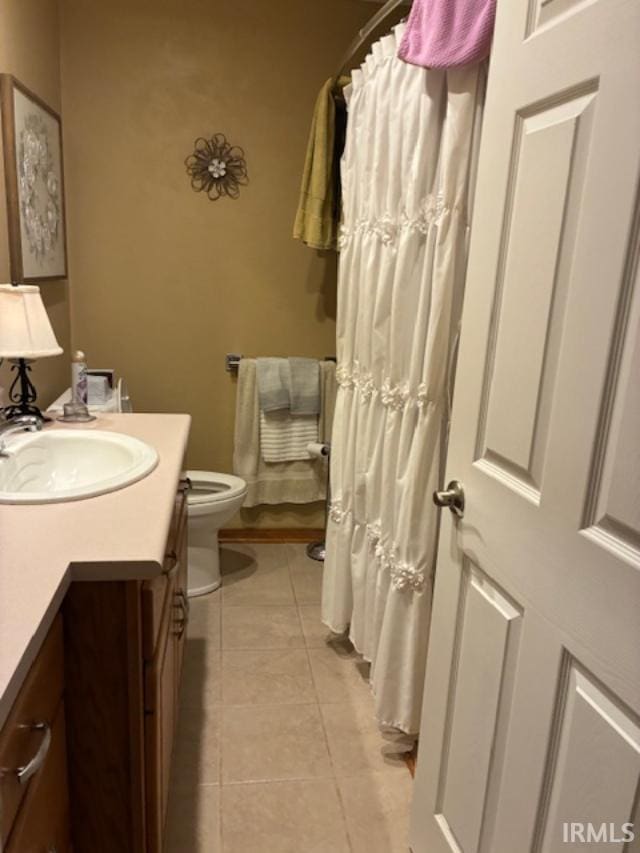 1814 W Kem Rd, Marion, IN 46952 - full bath with vanity, tile patterned floors, and a shower with curtain