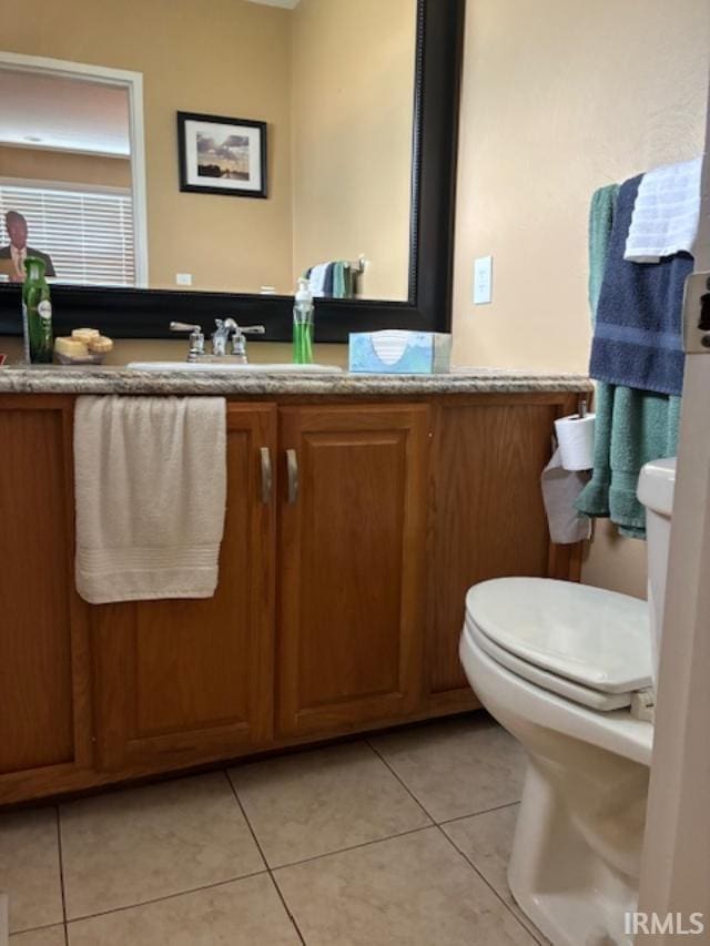 1814 W Kem Rd, Marion, IN 46952 - bathroom with tile patterned flooring and vanity