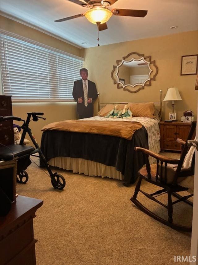 1814 W Kem Rd, Marion, IN 46952 - bedroom featuring light carpet and a ceiling fan