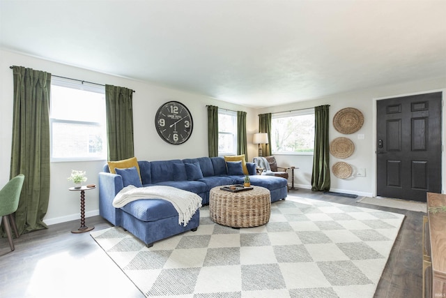 1621 E Madison St, South Bend, IN 46617 - living room with baseboards and light wood-style floors