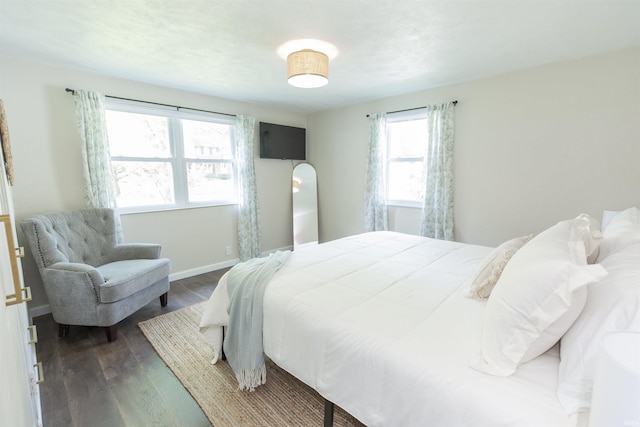 1621 E Madison St, South Bend, IN 46617 - bedroom featuring dark wood-style floors and baseboards