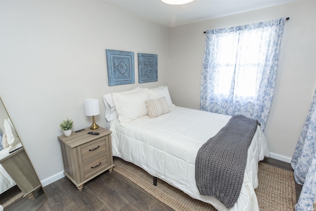 1621 E Madison St, South Bend, IN 46617 - bedroom featuring dark wood finished floors and baseboards