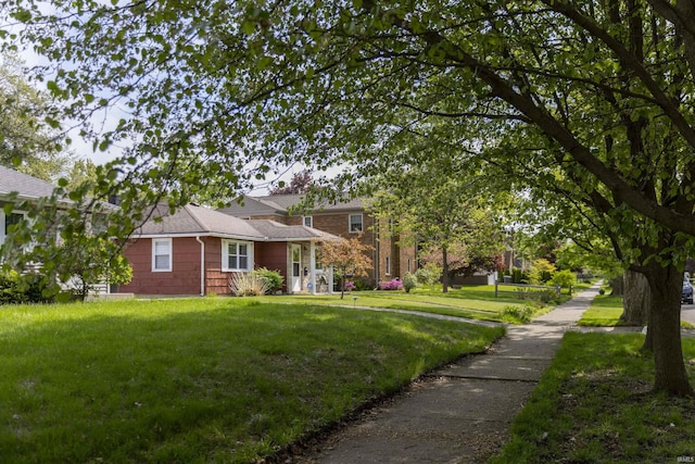 1621 E Madison St, South Bend, IN 46617 - view of front of house with a front yard and roof with shingles