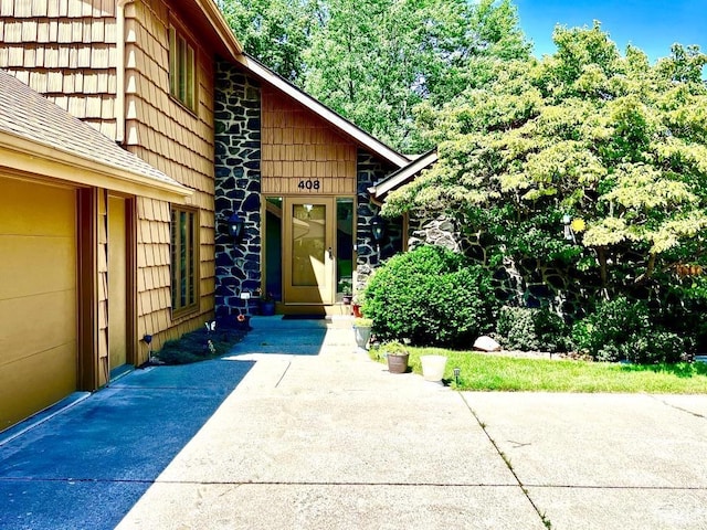 408 Duryea Dr, Auburn, IN 46706 - doorway to property with roof with shingles