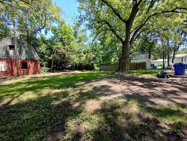 307 W Bender St, Knox, IN 46534 - view of grassy yard with an outbuilding and a barn