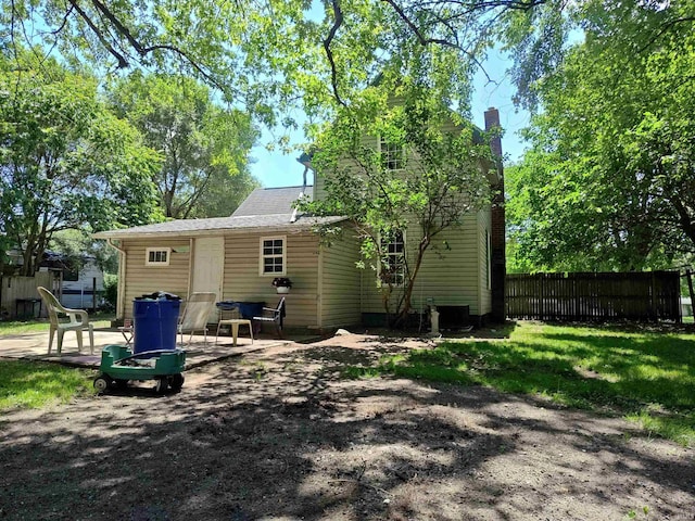307 W Bender St, Knox, IN 46534 - back of property featuring a chimney and a patio