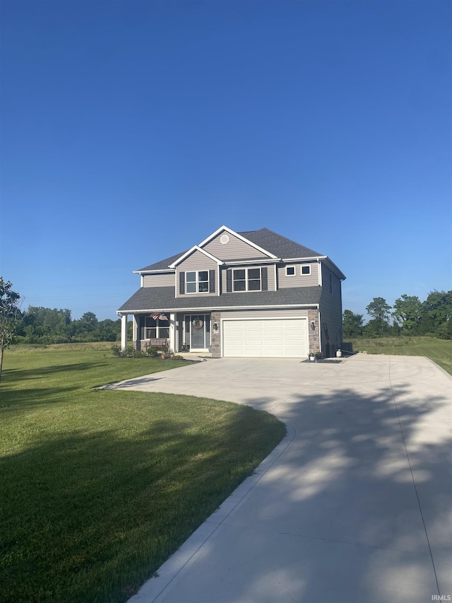 17030 Hand Rd, Huntertown, IN 46748 - view of front of house featuring driveway, a garage, a front yard, and covered porch