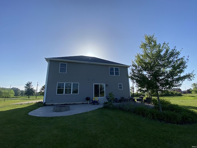 17030 Hand Rd, Huntertown, IN 46748 - rear view of house with a patio area, a yard, and entry steps