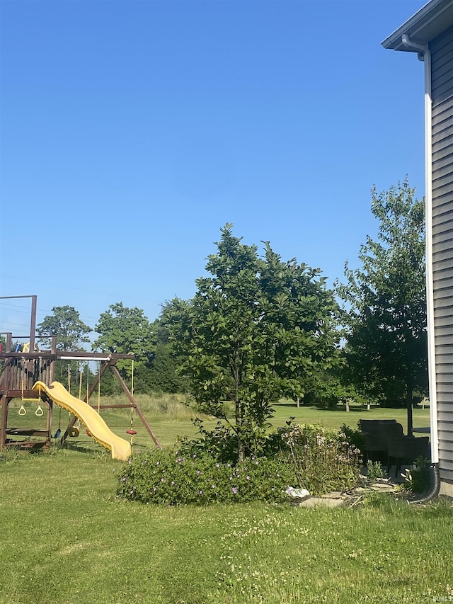 17030 Hand Rd, Huntertown, IN 46748 - view of green lawn featuring a playground