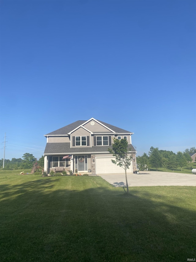 17030 Hand Rd, Huntertown, IN 46748 - view of front of home featuring an attached garage, concrete driveway, a porch, and a front lawn