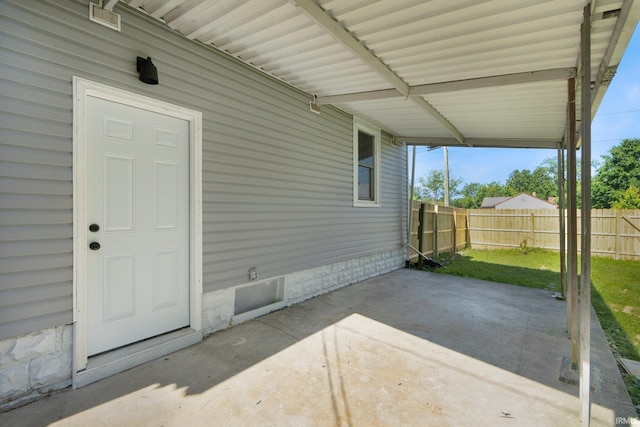 118 Burns Blvd, Fort Wayne, IN 46807 - fenced backyard with an attached carport and a patio