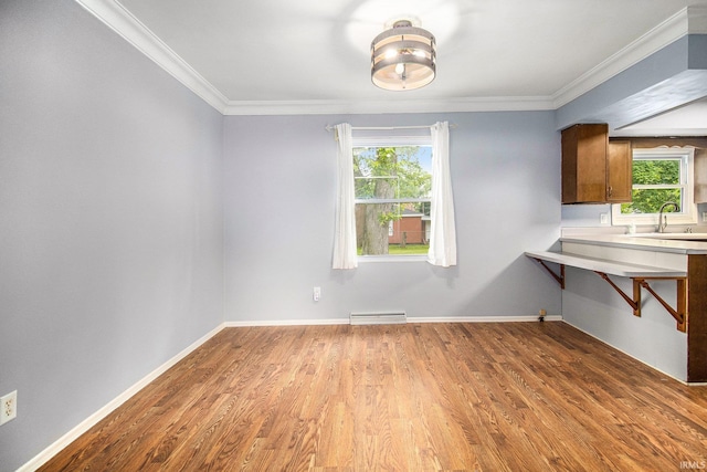 1822 Sherman Ave, South Bend, IN 46616 - unfurnished dining area with wood finished floors, crown molding, and a chandelier