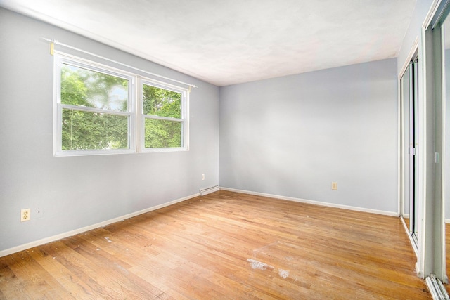 1822 Sherman Ave, South Bend, IN 46616 - empty room featuring light wood finished floors and baseboards