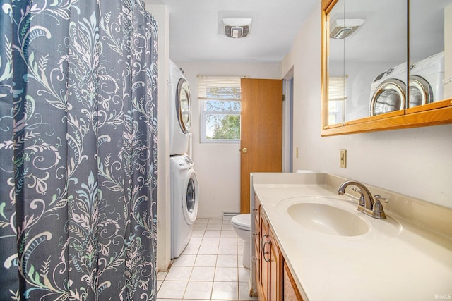 1822 Sherman Ave, South Bend, IN 46616 - full bathroom featuring stacked washer and clothes dryer, vanity, tile patterned flooring, and a shower with shower curtain