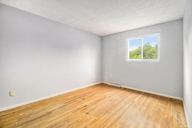 1822 Sherman Ave, South Bend, IN 46616 - empty room featuring baseboards and light wood finished floors
