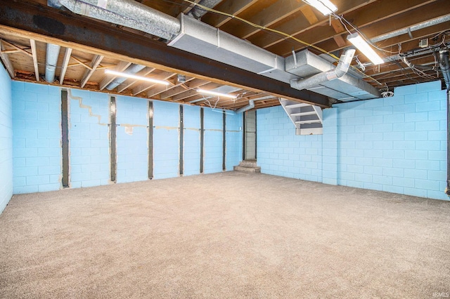 1822 Sherman Ave, South Bend, IN 46616 - unfinished basement with carpet and concrete block wall