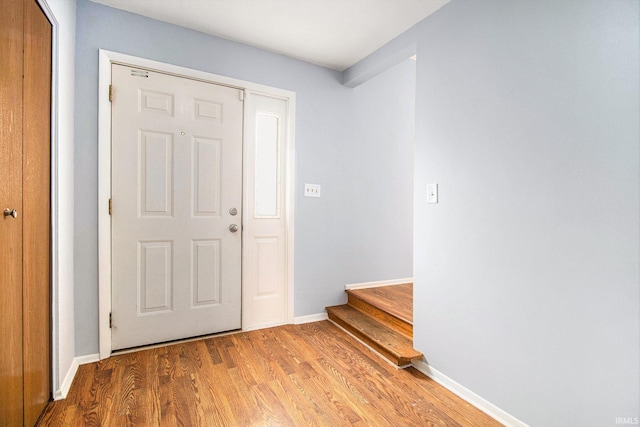1822 Sherman Ave, South Bend, IN 46616 - entrance foyer featuring light wood finished floors and stairway