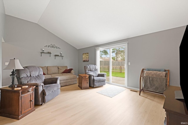 8620 Shearwater Pass, Fort Wayne, IN 46825 - living room featuring light wood-style flooring and lofted ceiling