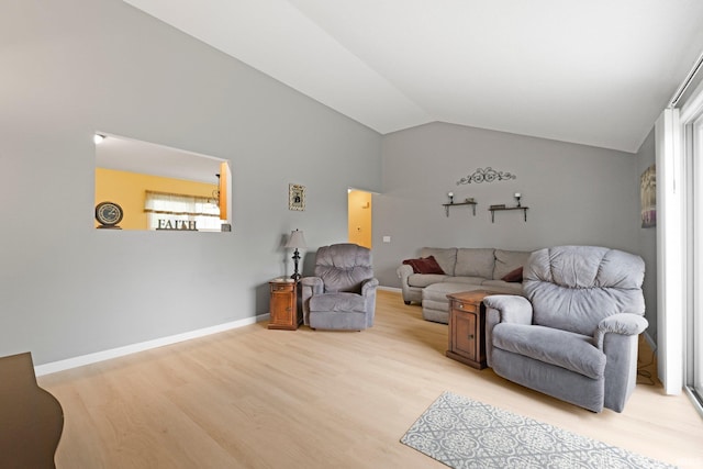 8620 Shearwater Pass, Fort Wayne, IN 46825 - living area with light wood finished floors and vaulted ceiling