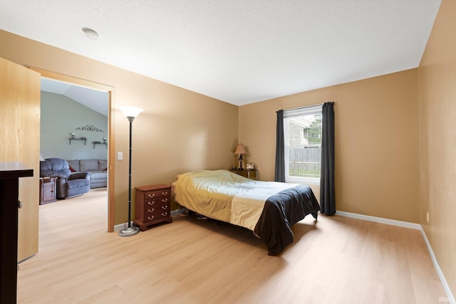 8620 Shearwater Pass, Fort Wayne, IN 46825 - bedroom with light wood-style floors and baseboards