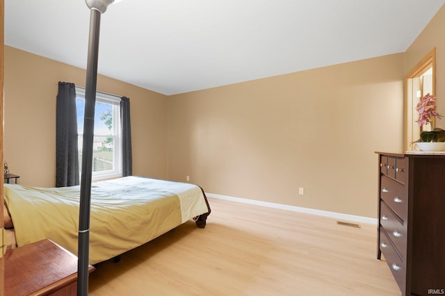 8620 Shearwater Pass, Fort Wayne, IN 46825 - bedroom featuring light wood-style floors and baseboards