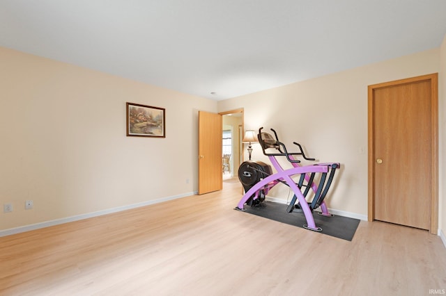 8620 Shearwater Pass, Fort Wayne, IN 46825 - exercise area featuring wood finished floors and baseboards