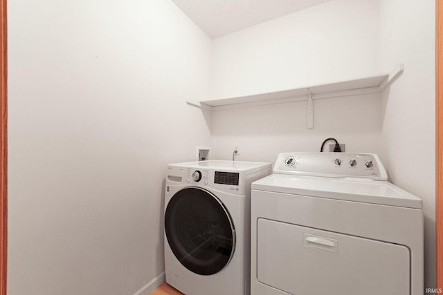 8620 Shearwater Pass, Fort Wayne, IN 46825 - laundry area with washing machine and dryer