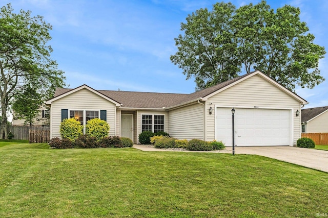 8620 Shearwater Pass, Fort Wayne, IN 46825 - single story home with concrete driveway, a garage, and roof with shingles