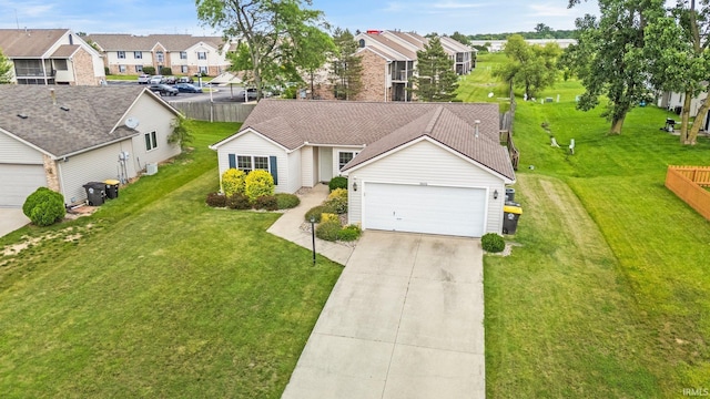 8620 Shearwater Pass, Fort Wayne, IN 46825 - view of front of house with a garage, concrete driveway, a residential view, and a front yard