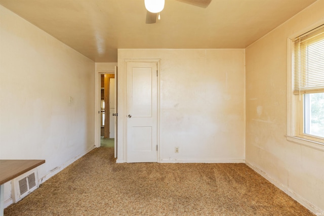517 S Edison Ave, South Bend, IN 46619 - unfurnished room with carpet and a ceiling fan