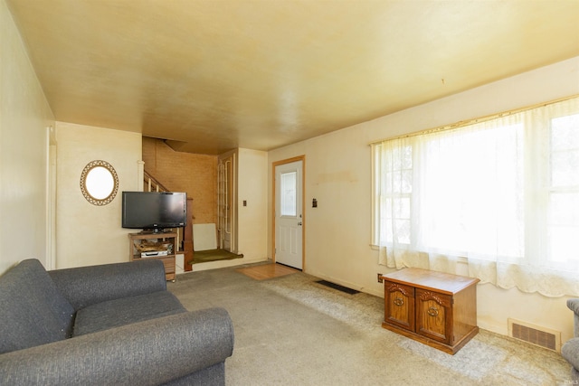 517 S Edison Ave, South Bend, IN 46619 - living room featuring carpet flooring and stairway