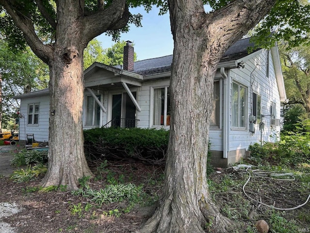 9219 N 100 W, West Lafayette, IN 47906 - view of property exterior featuring a chimney