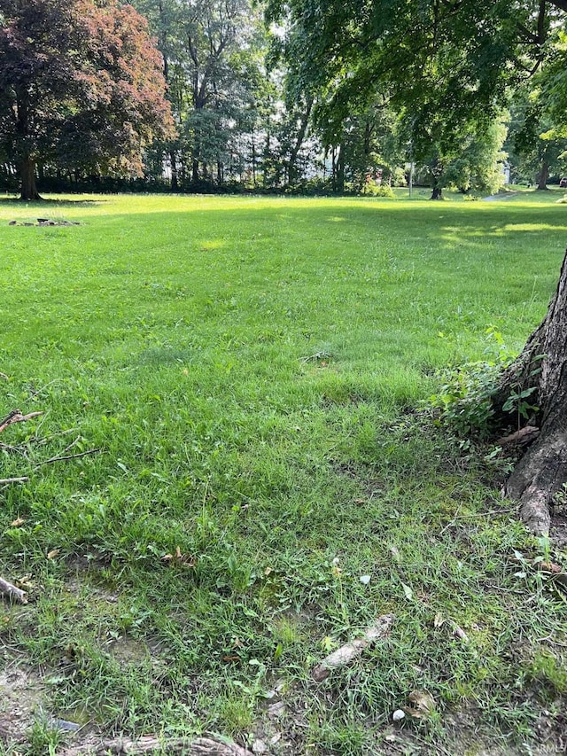 9219 N 100 W, West Lafayette, IN 47906 - view of grassy yard with view of wooded area