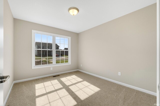 13969 Diavik Pl, Fort Wayne, IN 46845 - spare room featuring carpet floors and baseboards
