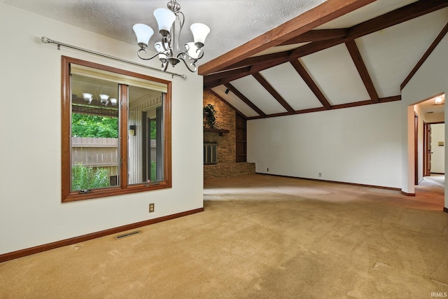 708 Forest Dr, Frankfort, IN 46041 - unfurnished living room featuring a chandelier, carpet floors, and a brick fireplace