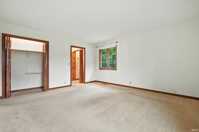 708 Forest Dr, Frankfort, IN 46041 - unfurnished bedroom featuring light colored carpet and a closet