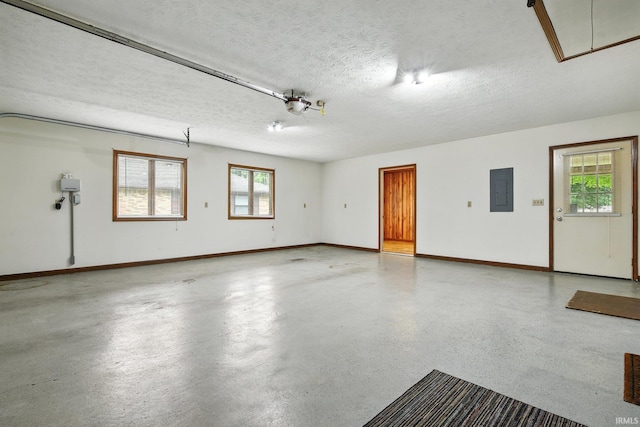 708 Forest Dr, Frankfort, IN 46041 - garage featuring electric panel and baseboards