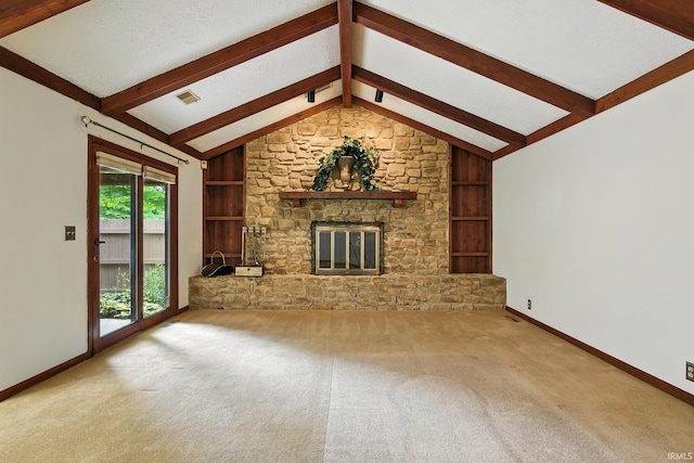 708 Forest Dr, Frankfort, IN 46041 - unfurnished living room with built in shelves, carpet, a fireplace, and a textured ceiling