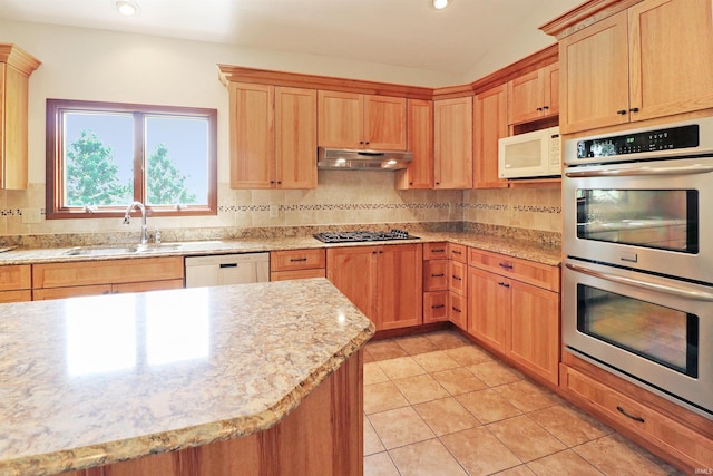 9932 N Meridian Line Rd, West Lafayette, IN 47906 - kitchen with white appliances, under cabinet range hood, decorative backsplash, light tile patterned flooring, and light stone counters