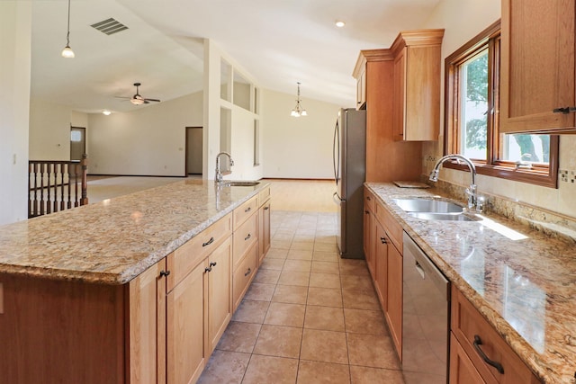9932 N Meridian Line Rd, West Lafayette, IN 47906 - kitchen featuring stainless steel appliances, an island with sink, a ceiling fan, light stone counters, and pendant lighting