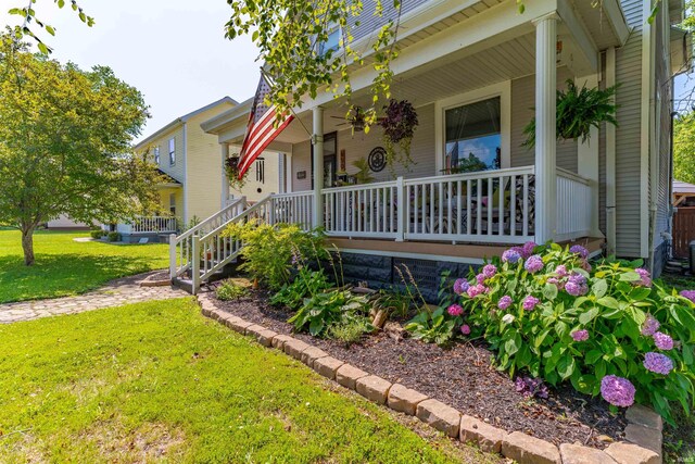 650 Main St, Rockport, IN 47635 - view of front facade with a porch and a front lawn