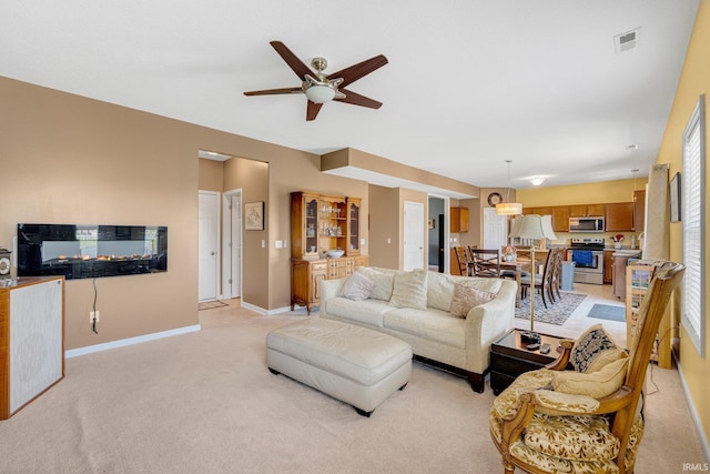 1823 Apopka Way, Fort Wayne, IN 46814 - living area featuring light colored carpet and a ceiling fan