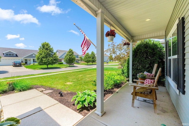 1823 Apopka Way, Fort Wayne, IN 46814 - porch featuring a lawn and a residential view